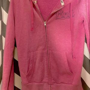 PINK (pink) zip up hoodie.